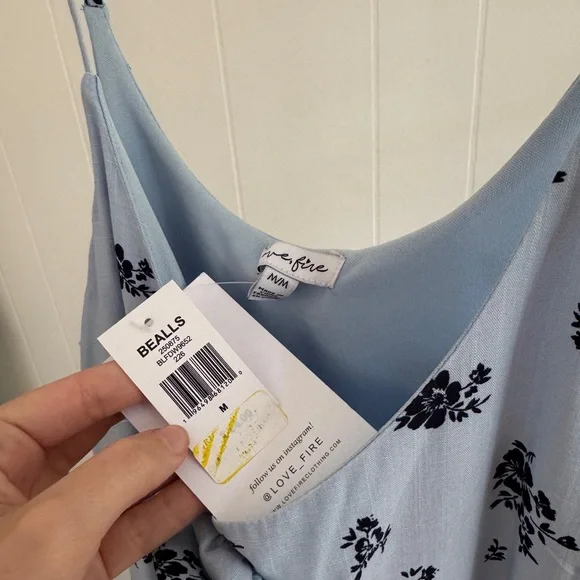 Light Blue Dress with Navy Floral Pattern and Rosette Detail - Picture 5 of 5